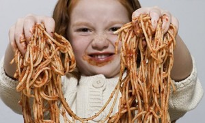 Girl holding spaghetti